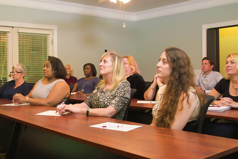 Caregivers receive hands-on training during orientation